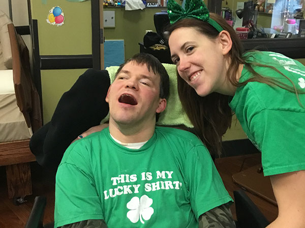 Two people in St. Patrick's day gear