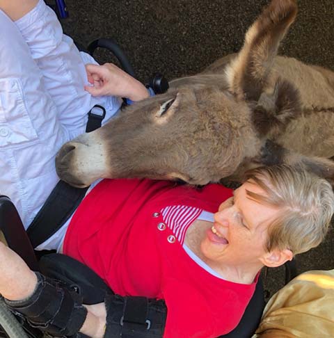 Verland resident with a donkey